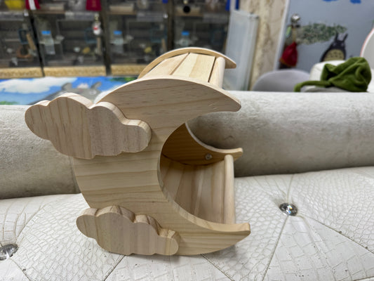 Crescent wooden house attachable to cage