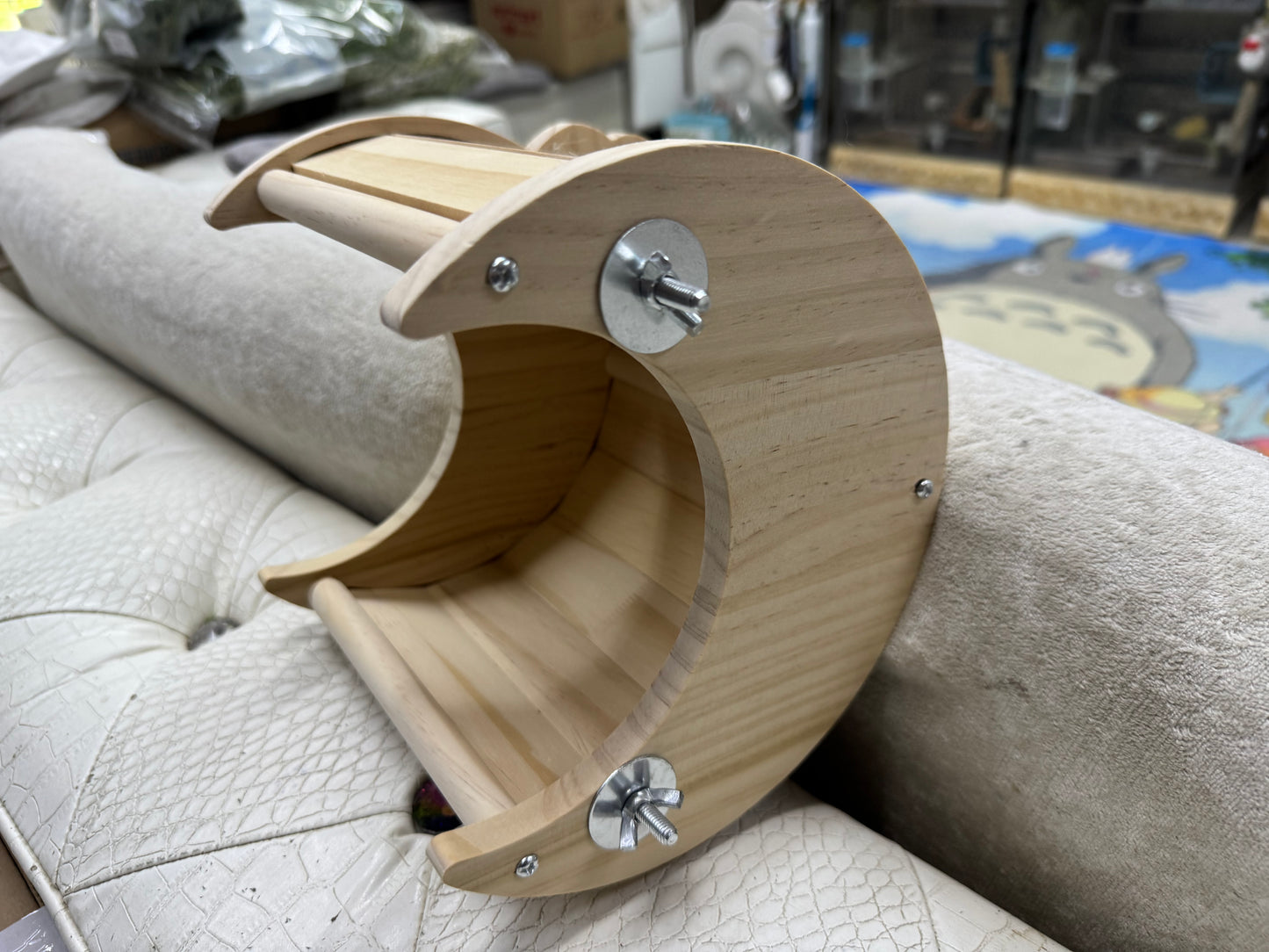 Crescent wooden house attachable to cage