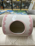 Ceramic house 20 cm length by 18 cm diameter. Opening is 10 cm diameter. Can fit jumbo chinchillas